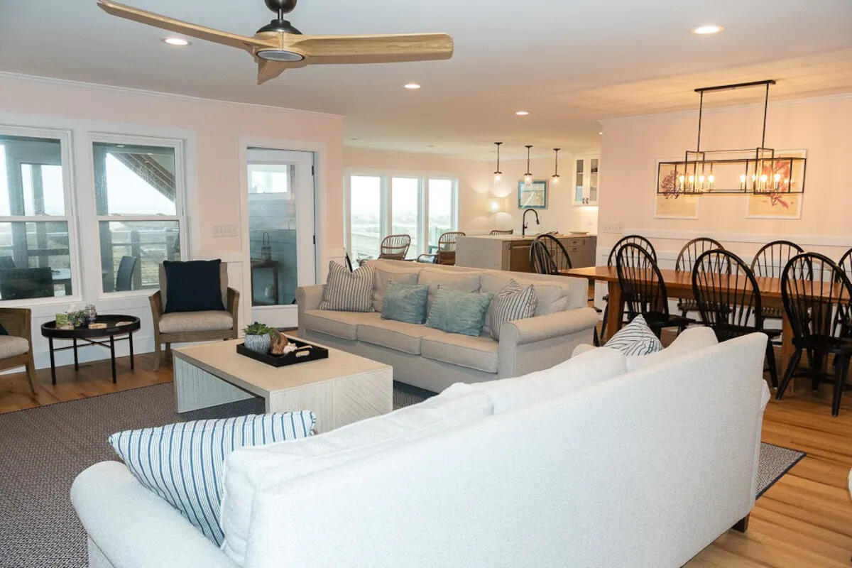 Living room with sofas and ocean-view windows